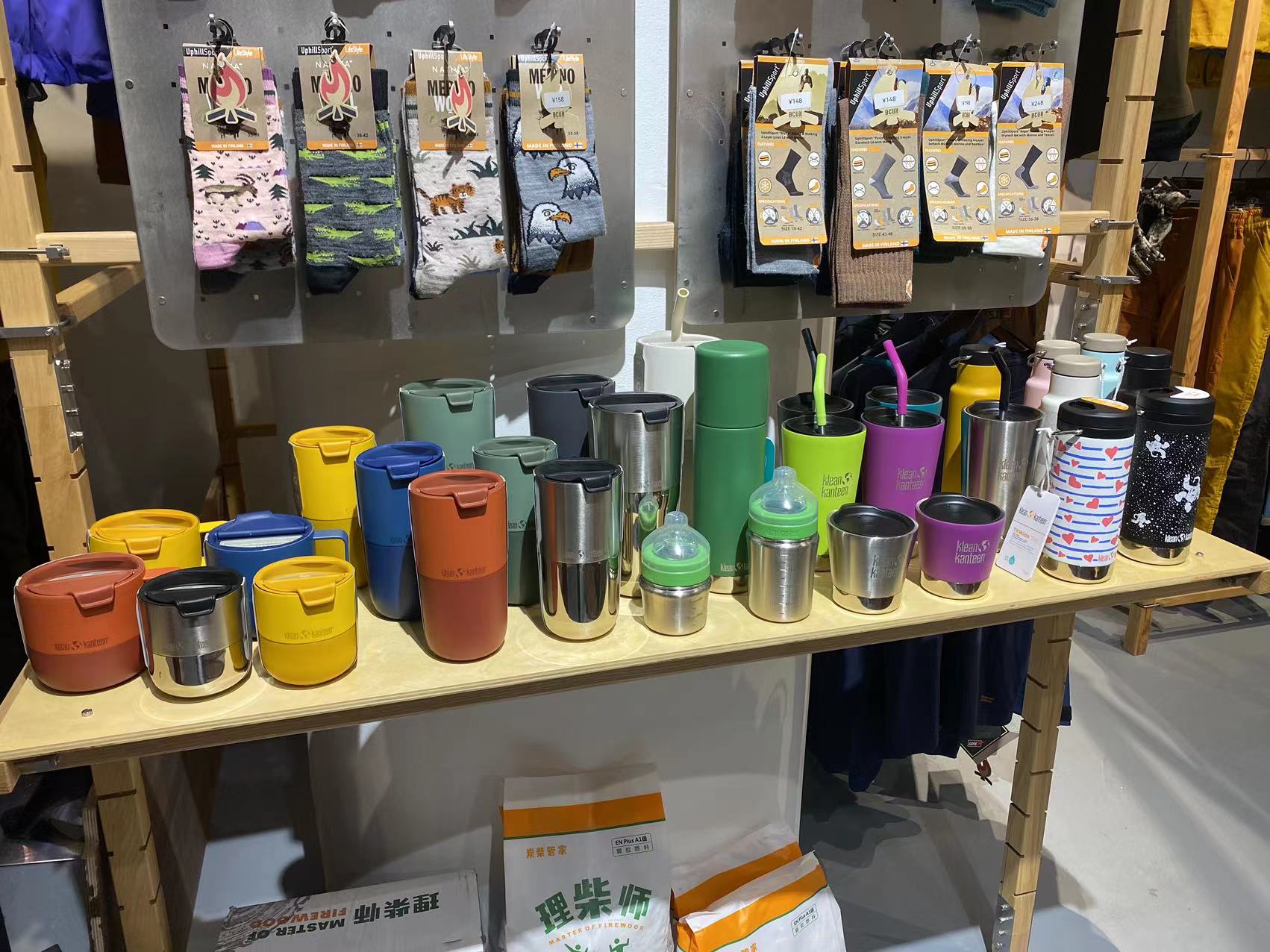 Klean Kanteen insulated bottles and lifestyle accessories on a shelf at an imported-goods supermarket in China