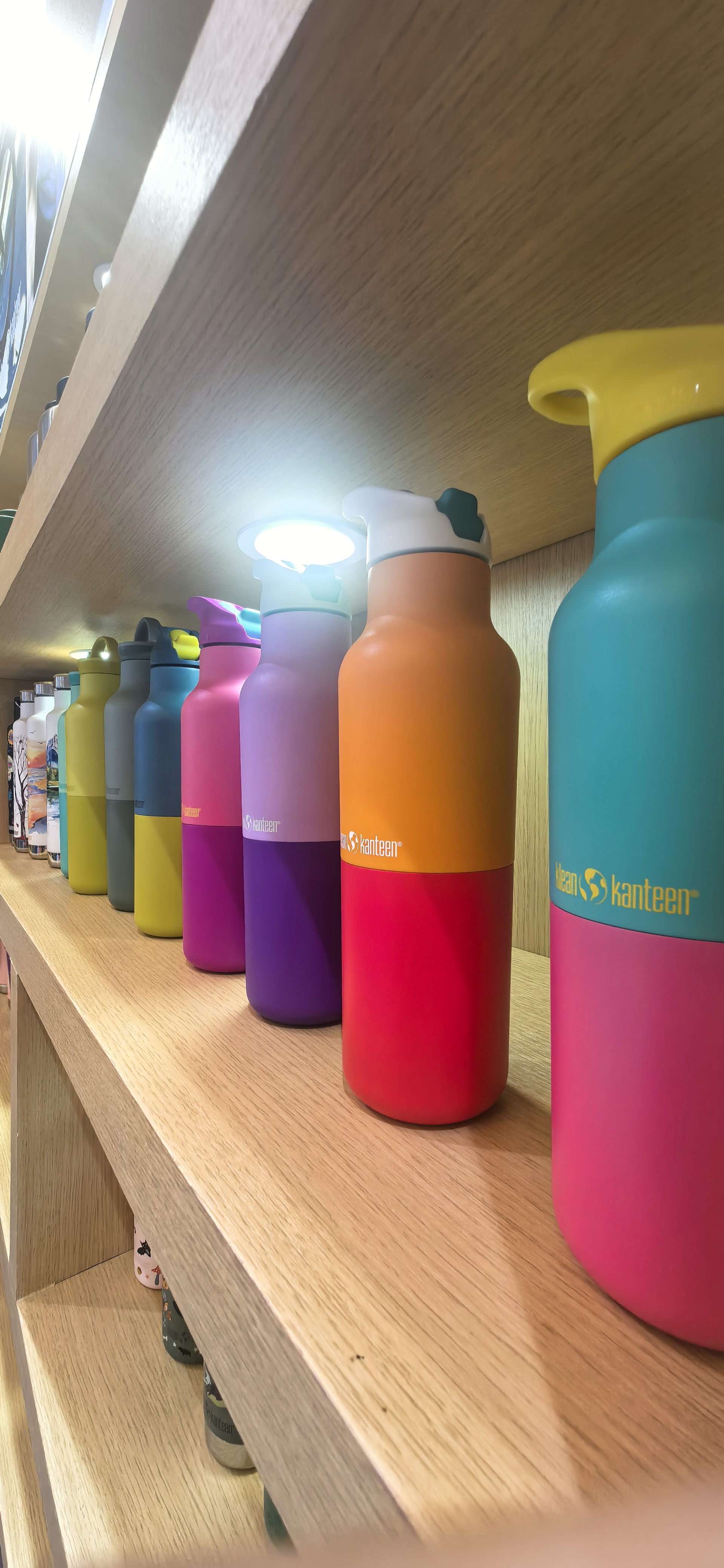 Klean Kanteen reusable bottles on a supermarket shelf