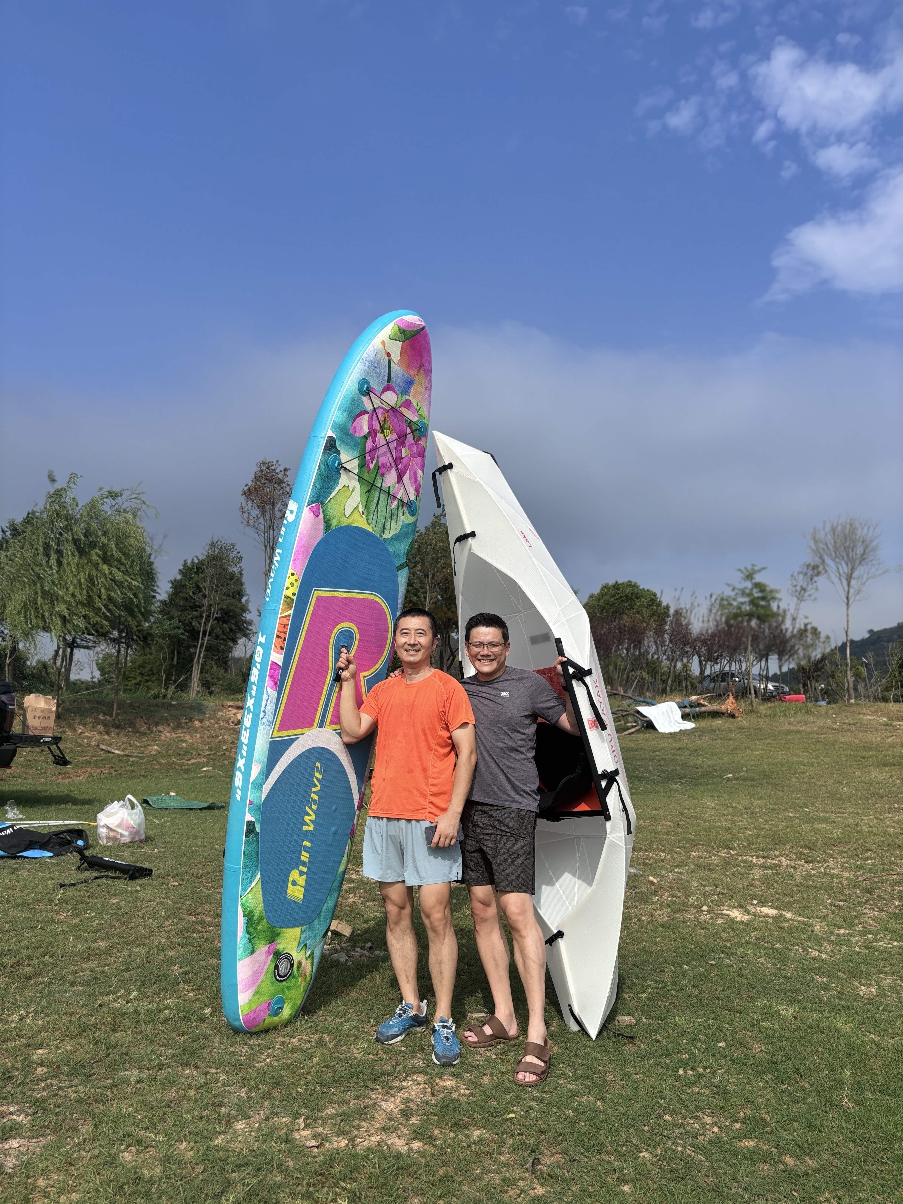 Frank Gao and Luo Hai co-founder with SUP boards